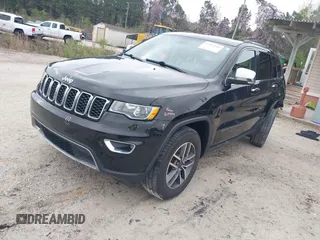 2021 Jeep Grand Cherokee Limited with VIN 1C4RJFBG8MC678548, listed as a IAAI auction lot 41912645 with 73,594 mi miles and . Bid and sale history available at DreamBid. Image 18.