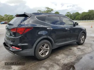 2017 Hyundai Santa Fe 2.4L with VIN 5NMZUDLB8HH048454, listed as a Copart auction lot 64727415 with 82,828 mi miles and Salvage title. Bid and sale history available at DreamBid. Image 3.