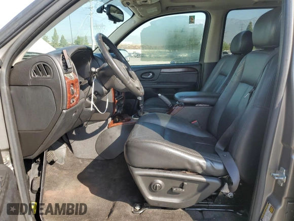2005 GMC Envoy SLT with VIN 1GKDS13S952382088, listed as a Copart auction lot 64765154 with 177,333 mi miles and Salvage Title. Bid and sale history available at carsss.com. Image 7.