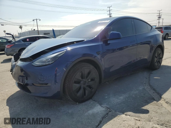 2024 Tesla Model Y with VIN 7SAYGDED0RF102479, listed as a Copart auction lot 55431975 with 23,989 mi miles and Salvage title. Bid and sale history available at DreamBid. Image 1.