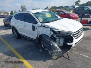 2016 Hyundai Tucson Limited with VIN KM8J33A22GU260251, listed as a IAAI auction lot 41167236 with 98,309 mi miles. Bid and sale history available at carsss.com. Image 1.