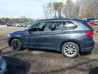 2014 BMW X5 xDrive35i with VIN 5UXKR0C55E0K47655, listed as a IAAI auction lot 41643776 with 154,380 mi miles. Bid and sale history available at carsss.com. Image 14.
