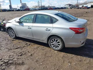 2019 Nissan Sentra S z VIN 3N1AB7APXKY372220, wystawiony jako IAAI lot #41723914 z przebiegiem 103 308 mil mil oraz . Historia ofert i sprzedaży dostępna na DreamBid. Obrazek 3.