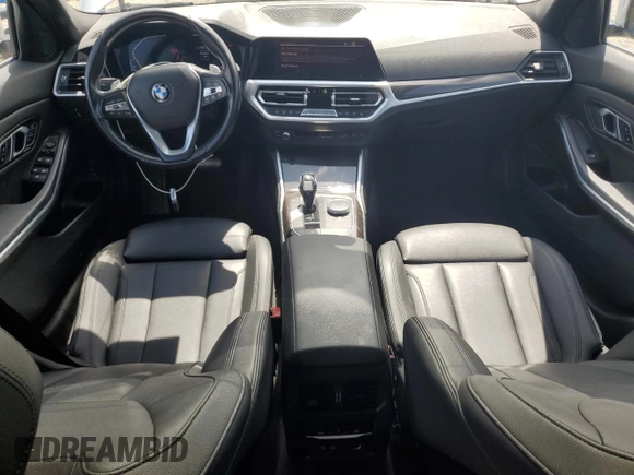 2020 BMW 3 Series 330i with VIN WBA5R1C07LFH40014, listed as a Copart auction lot 60656645 with 76,392 mi miles and Clean title. Bid and sale history available at DreamBid. Image 8.