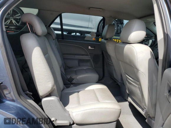2005 Ford Freestyle SEL z VIN 1FMDK021X5GA25385, wystawiony jako Copart lot #72239954 z przebiegiem 161 219 mil mil oraz Szkoda całkowita • Salvage title. Historia ofert i sprzedaży dostępna na DreamBid. Obrazek 11.
