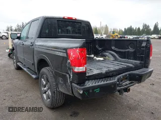 2012 Nissan Titan SV with VIN 1N6BA0EJ0CN303050, listed as a IAAI auction lot 41892370 with 120,018 mi miles. Bid and sale history available at carsss.com. Image 3.