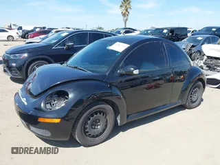 2010 Volkswagen New Beetle Coupe with VIN 3VWPG3AG5AM013832, listed as a IAAI auction lot 41807575 with 141,510 mi miles. Bid and sale history available at carsss.com. Image 2.