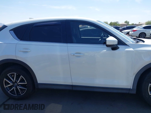 2018 Mazda CX-5 Grand Touring с VIN JM3KFADM7J0373815, выставлен на аукционе IAAI как лот 42500311 с пробегом 106 354 миль миль и . История ставок и продаж доступна на DreamBid. Изображение 13.