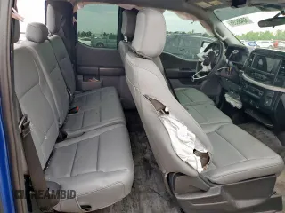 2023 Ford F-150 XL z VIN 1FTEX1C56PKF09894, wystawiony jako Copart lot #60458395 z przebiegiem 65 615 mil mil oraz Szkoda całkowita • Salvage title. Historia ofert i sprzedaży dostępna na DreamBid. Obrazek 10.