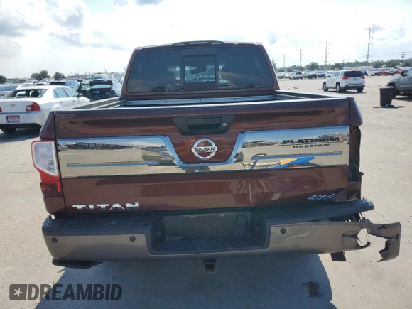 2018 Nissan Titan Pro-4X z VIN 1N6AA1E50JN526481, wystawiony jako Copart lot #71800504 z przebiegiem 147 463 mil mil oraz Szkoda całkowita • Salvage title. Historia ofert i sprzedaży dostępna na DreamBid. Obrazek 6.