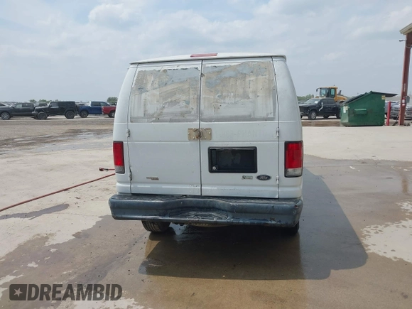 2012 Ford Econoline Cargo Recreational with VIN 1FTNE2EW2CDA43588, listed as a IAAI auction lot 41939220 with 246,855 mi miles. Bid and sale history available at carsss.com. Image 16.