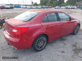 2012 Suzuki Kizashi SE with VIN JS2RE9A31C6101027, listed as a IAAI auction lot 41213426 with 174,490 mi miles. Bid and sale history available at carsss.com. Image 4.