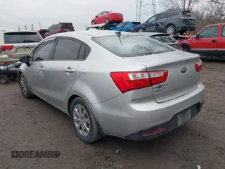 2015 Kia Rio LX with VIN KNADM4A39F6452036, listed as a IAAI auction lot 41516879 with 95,775 mi miles. Bid and sale history available at carsss.com. Image 3.