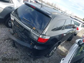 2013 Dodge Durango Crew with VIN 1C4RDJDG2DC674485, listed as a IAAI auction lot 41505803 with 152,835 mi miles. Bid and sale history available at carsss.com. Image 4.