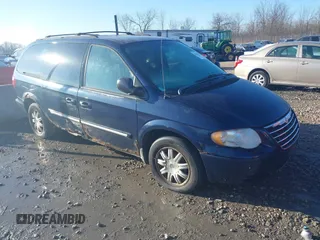 2006 Chrysler Town & Country Touring with VIN 2A4GP54L46R805276, listed as a IAAI auction lot 41036582 with 145,534 mi miles and . Bid and sale history available at DreamBid. Image 1.