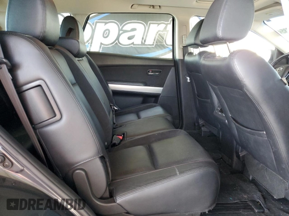 2015 Mazda CX-9 Grand Touring z VIN JM3TB3DV2F0456130, wystawiony jako Copart lot #55787935 z przebiegiem 120 888 mil mil oraz Szkoda całkowita • Salvage title. Historia ofert i sprzedaży dostępna na DreamBid. Obrazek 10.