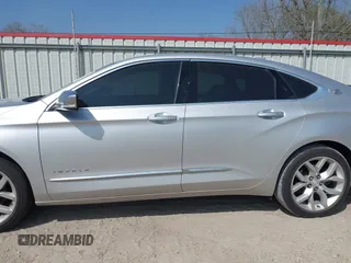 2019 Chevrolet Impala Premier with VIN 1G1105S38KU104068, listed as a IAAI auction lot 41780641 with 96,921 mi miles and . Bid and sale history available at DreamBid. Image 14.