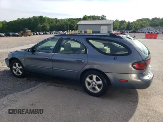 2001 Ford Taurus SE Standard with VIN 1FAHP58S71G184725, listed as a Copart auction lot 56401895 with 163,238 mi miles and Salvage title. Bid and sale history available at DreamBid. Image 2.
