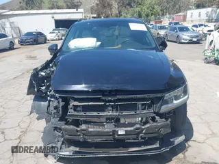 2021 Volkswagen Tiguan SE with VIN 3VV3B7AX0MM015825, listed as a IAAI auction lot 41955268 with 57,909 mi miles and . Bid and sale history available at DreamBid. Image 12.