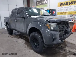2013 Nissan Frontier SV with VIN 1N6AD0EV5DN734619, listed as a IAAI auction lot 41300993 with 104,013 mi miles. Bid and sale history available at carsss.com. Image 1.