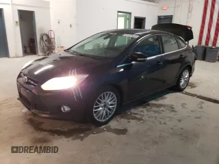2012 Ford Focus SEL with VIN 1FAHP3H23CL329287, listed as a Copart auction lot 51127495 with 147,868 mi miles and Salvage Title. Bid and sale history available at carsss.com. Image 1.