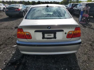 2004 BMW 3 Series 325i z VIN WBAET374X4NJ83744, wystawiony jako Copart lot #58296045 z przebiegiem 129 955 mil mil oraz Szkody całkowita. Historia ofert i sprzedaży dostępna na DreamBid. Obrazek 6.