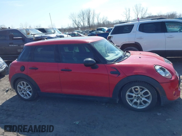 2017 MINI Hardtop 4 Door Cooper S z VIN WMWXU3C36H2F49616, wystawiony jako IAAI lot #41800805 z przebiegiem 114 259 mil mil oraz . Historia ofert i sprzedaży dostępna na DreamBid. Obrazek 13.