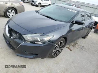 2016 Nissan Maxima S with VIN 1N4AA6AP2GC412340, listed as a Copart auction lot 82605284 with 127,262 mi miles and Salvage Title. Bid and sale history available at DreamBid. Image 1.
