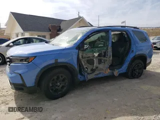 2024 Honda Pilot TrailSport z VIN 5FNYG1H68RB023909, wystawiony jako Copart lot #49959445 z przebiegiem Nie podano mil oraz Szkoda całkowita • Salvage title. Historia ofert i sprzedaży dostępna na DreamBid. Obrazek 1.
