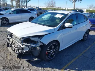 2015 Ford Focus ST with VIN 1FADP3L92FL380352, listed as a IAAI auction lot 41365139 with 136,226 mi miles. Bid and sale history available at carsss.com. Image 18.