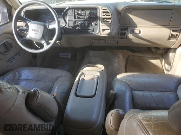 1999 GMC Yukon with VIN 1GKEC13R6XJ808715, listed as a Copart auction lot 83407094 with 340,933 mi miles and Salvage Title. Bid and sale history available at carsss.com. Image 8.