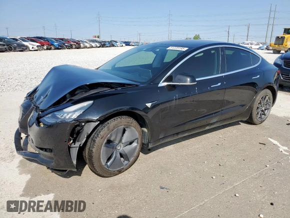 2019 Tesla Model 3 Mid Range with VIN 5YJ3E1EA9KF193033, listed as a Copart auction lot 51225195 with 72,722 mi miles and Salvage Title. Bid and sale history available at DreamBid. Image 1.