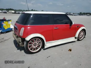 2004 MINI Hardtop with VIN WMWRC33444TC50103, listed as a Copart auction lot 63449615 with 144,467 mi miles and Salvage title. Bid and sale history available at DreamBid. Image 3.