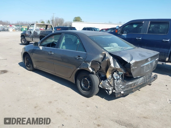 2003 Toyota Camry LE with VIN 4T1BE32K63U659008, listed as a IAAI auction lot 41790929 with 206,878 mi miles and . Bid and sale history available at DreamBid. Image 3.