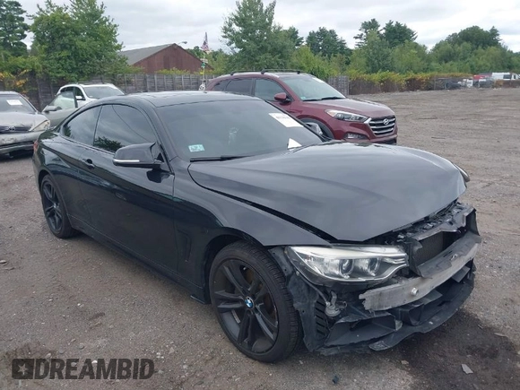 2015 BMW 4 Series 428i xDrive z VIN WBA3N9C56FK246586, wystawiony jako IAAI lot #40138540 z przebiegiem 127 512 mil mil oraz . Historia ofert i sprzedaży dostępna na DreamBid. Obrazek 1.