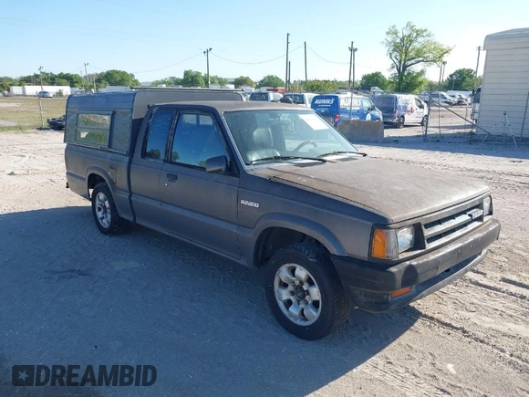 1992 Mazda B-Series Truck with VIN JM2UF3136N0270881, listed as a IAAI auction lot 41814384 with 202,785 mi miles and . Bid and sale history available at DreamBid. Image 1.