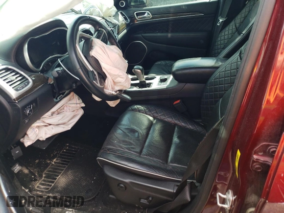 2019 Jeep Grand Cherokee Summit with VIN 1C4RJFJG8KC716651, listed as a Copart auction lot 63248974 with 91,177 mi miles and Salvage title. Bid and sale history available at DreamBid. Image 7.