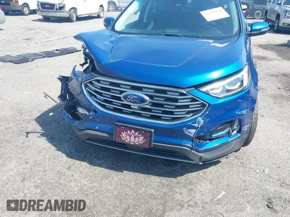 2020 Ford Edge Titanium with VIN 2FMPK4K96LBA55482, listed as a IAAI auction lot 42557716 with 61,509 mi miles and . Bid and sale history available at DreamBid. Image 6.