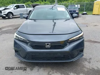 2023 Honda Civic EX with VIN 2HGFE1F73PH312228, listed as a IAAI auction lot 42185408 with 19,339 mi miles and . Bid and sale history available at DreamBid. Image 12.