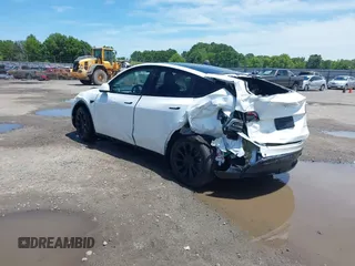 2023 Tesla Model Y Long Range z VIN 7SAYGDEE9PF753051, wystawiony jako IAAI lot #39615839 z przebiegiem Nie podano mil oraz . Historia ofert i sprzedaży dostępna na DreamBid. Obrazek 3.