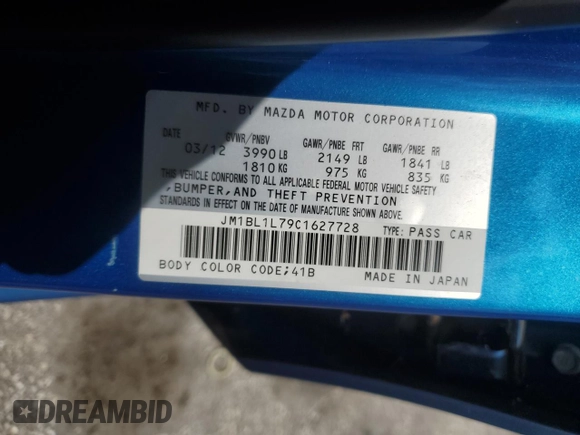 2012 Mazda 3 i Touring z VIN JM1BL1L79C1627728, wystawiony jako Copart lot #62873235 z przebiegiem 44 571 mil mil oraz Szkoda całkowita • Salvage title. Historia ofert i sprzedaży dostępna na DreamBid. Obrazek 13.