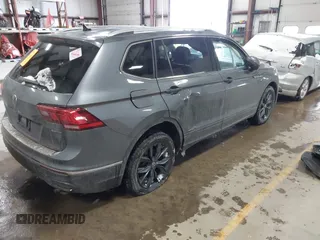 2023 Volkswagen Tiguan SE with VIN 3VVMB7AX5PM013447, listed as a IAAI auction lot 41615200 with 66,259 mi miles and . Bid and sale history available at DreamBid. Image 4.