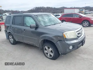 2011 Honda Pilot EX-L with VIN 5FNYF4H59BB042308, listed as a IAAI auction lot 41635511 with 196,736 mi miles and . Bid and sale history available at carsss.com. Image 1.