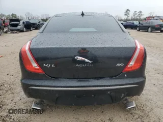 2014 Jaguar XJ Portfolio z VIN SAJWA2GZ2E8V64993, wystawiony jako Copart lot #88774965 z przebiegiem Nie podano mil oraz Szkoda całkowita • Salvage title. Historia ofert i sprzedaży dostępna na DreamBid. Obrazek 6.
