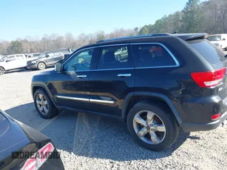 2013 Jeep Grand Cherokee Overland with VIN 1C4RJECG7DC644822, listed as a IAAI auction lot 41658872 with 156,838 mi miles. Bid and sale history available at carsss.com. Image 14.