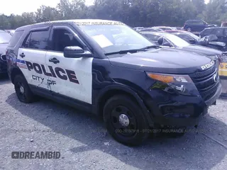 2014 Ford Utility Police Interceptor with VIN 1FM5K8AR1EGA33529, listed as a IAAI auction lot 20197918 with 75,052 mi miles. Bid and sale history available at carsss.com. Image 1.