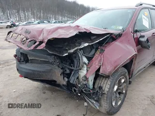 2019 Jeep Cherokee Trailhawk with VIN 1C4PJMBX1KD314149, listed as a IAAI auction lot 40929910 with 77,000 mi miles and . Bid and sale history available at DreamBid. Image 6.