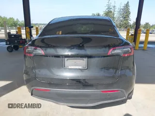 2022 Tesla Model Y Long Range with VIN 7SAYGDEE1NF550202, listed as a IAAI auction lot 42121718 with 28,211 mi miles and . Bid and sale history available at carsss.com. Image 16.