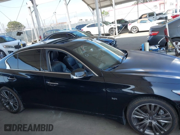 2018 Infiniti Q50 Luxe z VIN JN1EV7AP9JM353684, wystawiony jako IAAI lot #42444432 z przebiegiem 85 036 mil mil oraz . Historia ofert i sprzedaży dostępna na DreamBid. Obrazek 13.