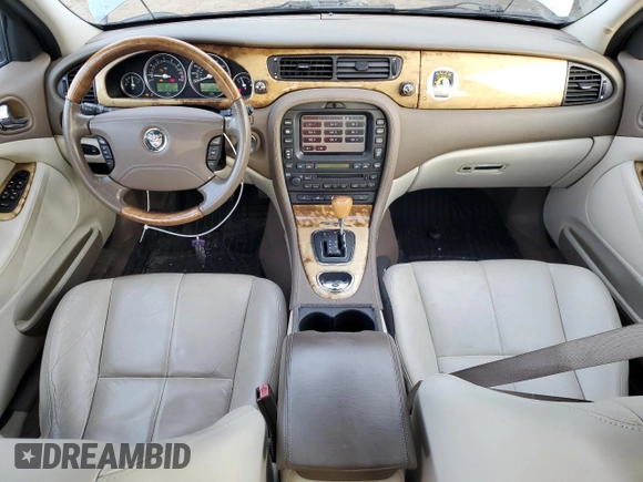 2005 Jaguar S-Type z VIN SAJWA01T45FN51425, wystawiony jako Copart lot #86682684 z przebiegiem 53 218 mil mil oraz Czysty tytuł • Clean title. Historia ofert i sprzedaży dostępna na DreamBid. Obrazek 8.